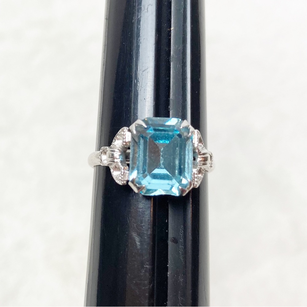 Sterling silver and emerald cut blue stone ring